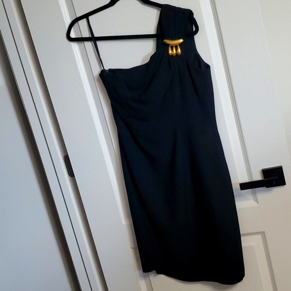 Woman's one shoulder black dress. Size 12